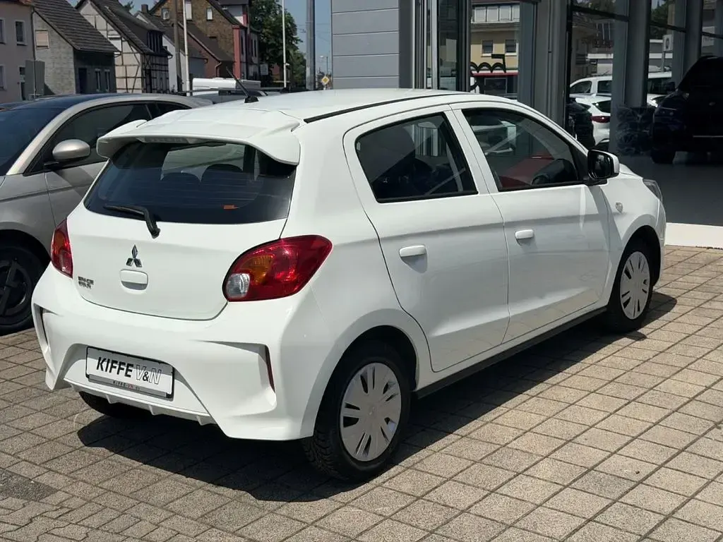 Gebraucht Mitsubishi Space Star Select 71 PS (52 kW) 2023 Islandweiss (s) Kleinwagen