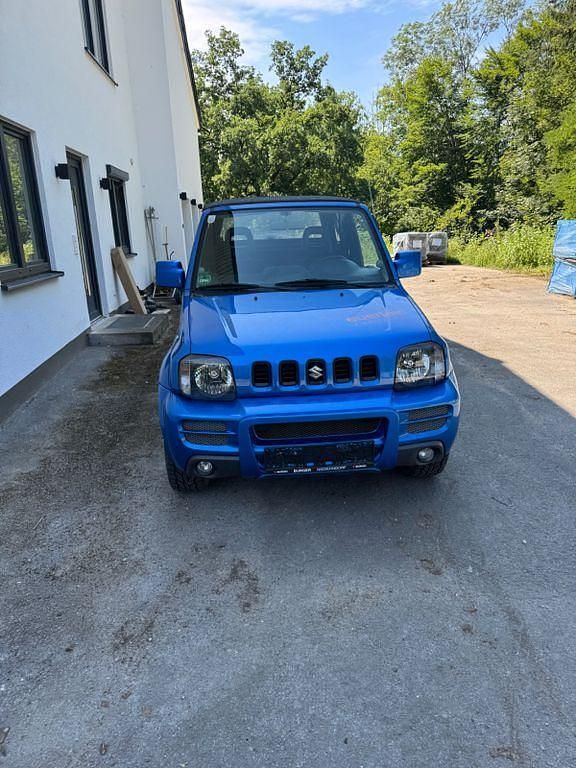 Blau Gebraucht 2005 Suzuki Jimny SUV | 3.200 € (Superpreis) - Bild 1/4