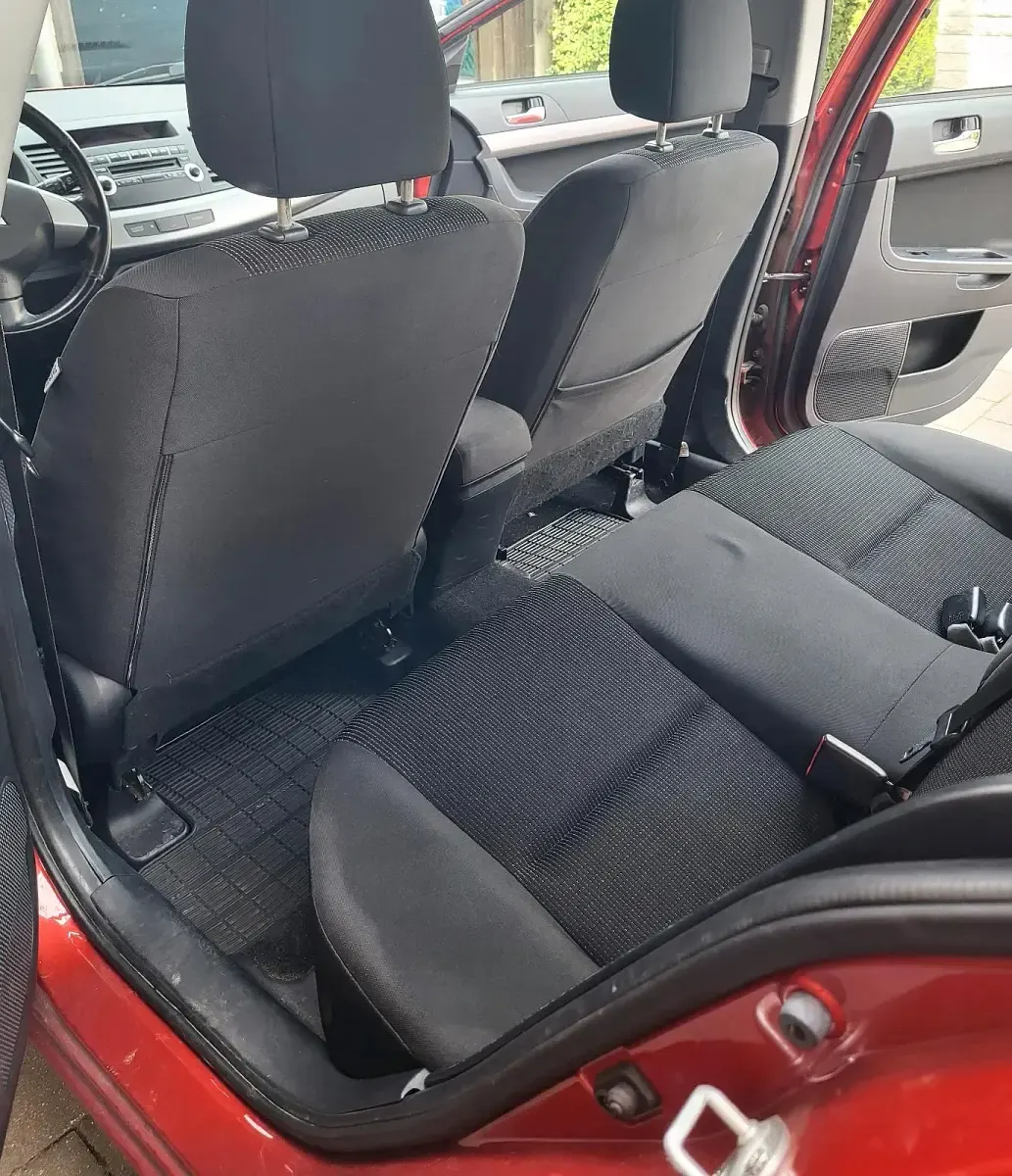 Gebraucht Mitsubishi Lancer 109 PS (80 kW) 2010 Rot Limousine