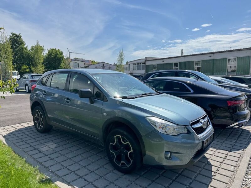 Grün Gebraucht 2013 Subaru XV Active SUV | 6.799 € (Superpreis) - Bild 1/4