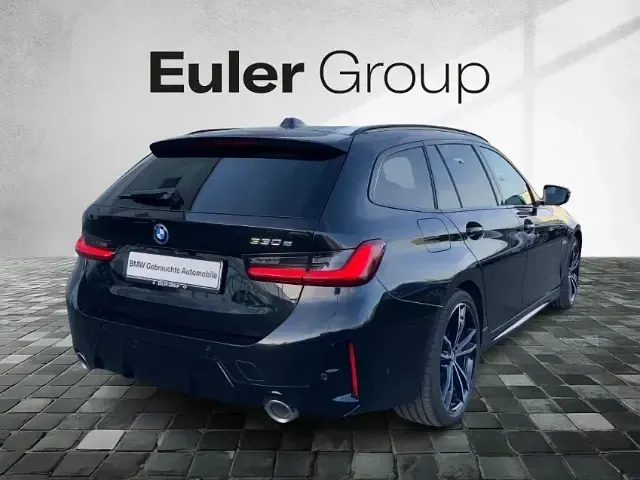 Gebraucht BMW 330e Performance 292 PS (214 kW) 2022 Saphirschwarz Kombi