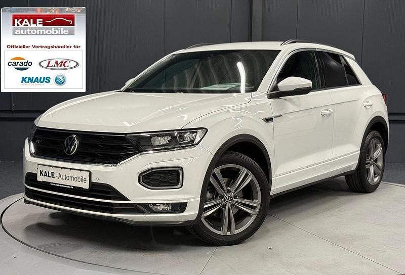 Weiß (pure white) Gebraucht 2021 VW T-Roc Sportline SUV | 23.490 € (Fairer Preis) - Bild 1/4