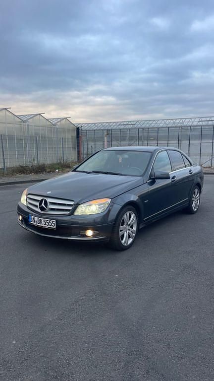 Grau Gebraucht 2009 Mercedes C180 Limousine | 5.100 € (Fairer Preis) - Bild 1/4
