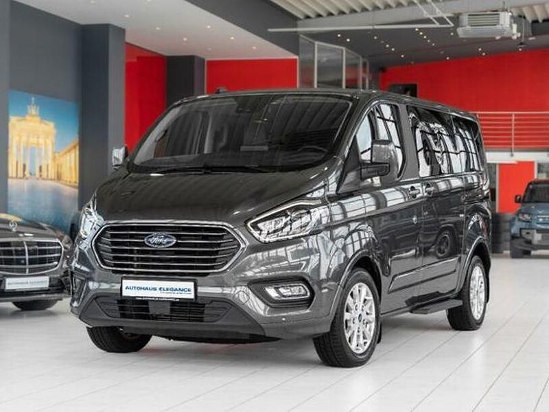 Grau Gebraucht 2022 Ford Tourneo Custom Titanium Van / Kleinbus | 29.980 € (Guter Preis) - Bild 1/4
