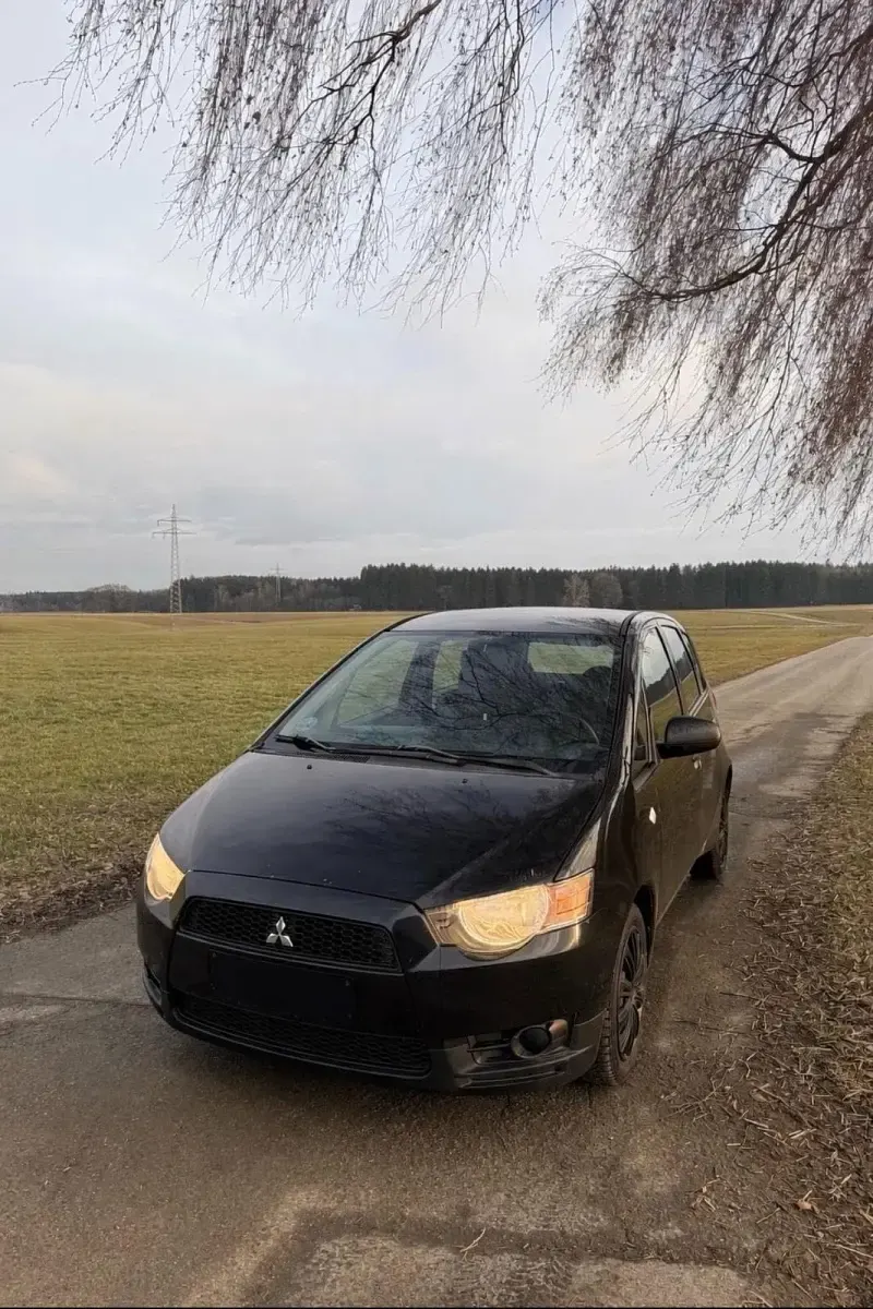Gebraucht Mitsubishi Colt 75 PS (55 kW) 2010 Schwarz Kleinwagen