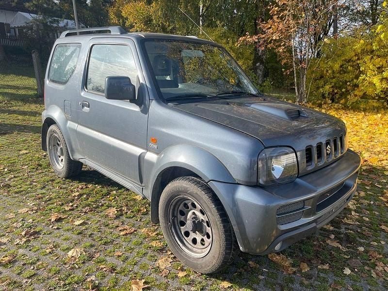 Grau Gebraucht 2007 Suzuki Jimny SUV | 3.800 € (Superpreis) - Bild 1/4