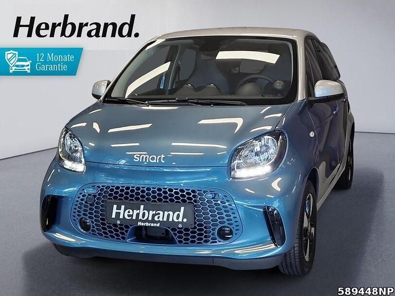 Karosserie in steel blue (meta Gebraucht 2020 Smart ForFour Electric Drive Passion Limousine | 9.890 € (Fairer Preis) - Bild 1/4