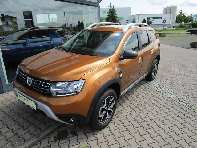 Atacamaorange (metallic) Gebraucht 2021 Dacia Duster Prestige SUV | 18.450 € (Fairer Preis) - Bild 1/4