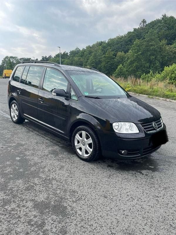 Schwarz Gebraucht 2006 VW Touran Trendline Van / Kleinbus | 2.450 € (Fairer Preis) - Bild 1/4