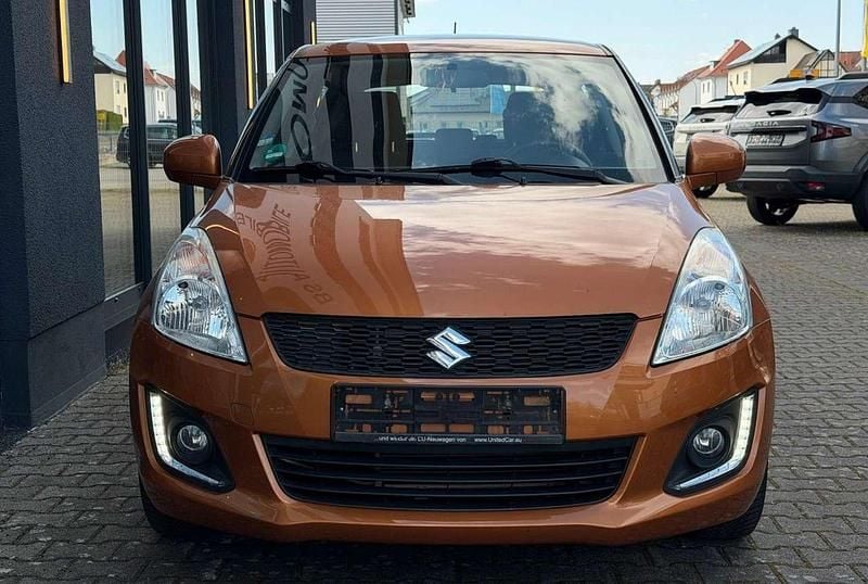 Gebraucht Suzuki Swift Comfort 94 PS (69 kW) 2016 Orange Kleinwagen