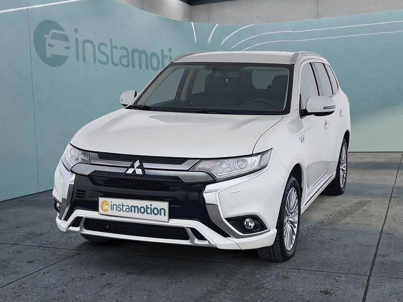 Weiß Gebraucht 2021 Mitsubishi Outlander P-HEV SUV | 23.299 € (Fairer Preis) - Bild 1/4