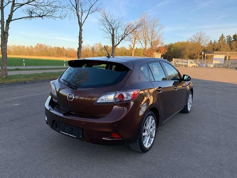 Gebraucht Mazda 3 Prime-Line 105 PS (77 kW) 2012 Autumn bronze mica Limousine