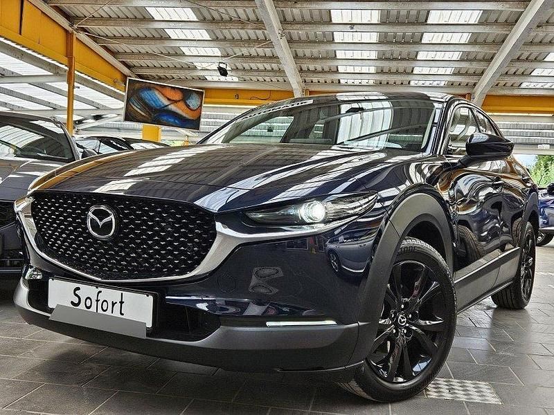 Deep crystal blue Gebraucht 2025 Mazda CX-30 Homura-Line SUV | 28.390 € (Superpreis) - Bild 1/1