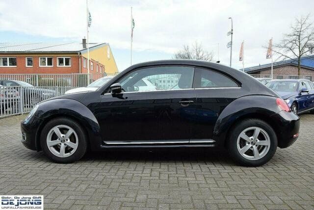 Gebraucht VW Beetle Design 105 PS (77 kW) 2012 Schwarz metallic Kleinwagen