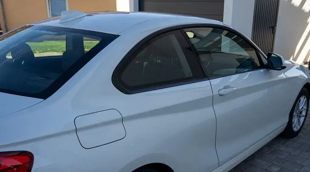 Używany BMW 218 Advantage 150 KM (110 kW) 2017 Biały Coupe