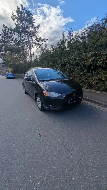 Gebraucht Mitsubishi Colt Edition 95 PS (69 kW) 2010 Schwarz Kleinwagen