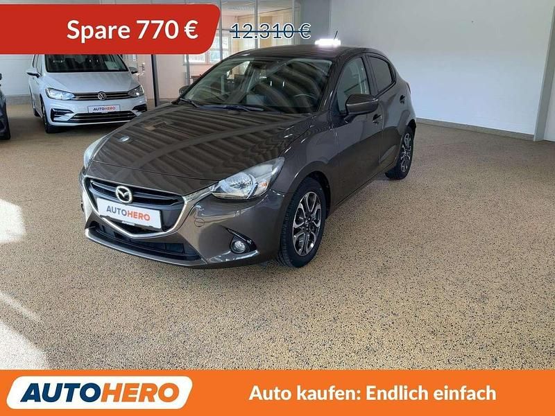 Titanium flash Gebraucht 2016 Mazda 2 Nakama Limousine | 11.540 € (Fairer Preis) - Bild 1/3