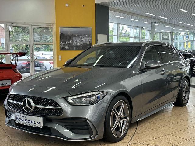 Grau Gebraucht 2022 Mercedes C200 AMG line Limousine | 37.850 € - Bild 1/4