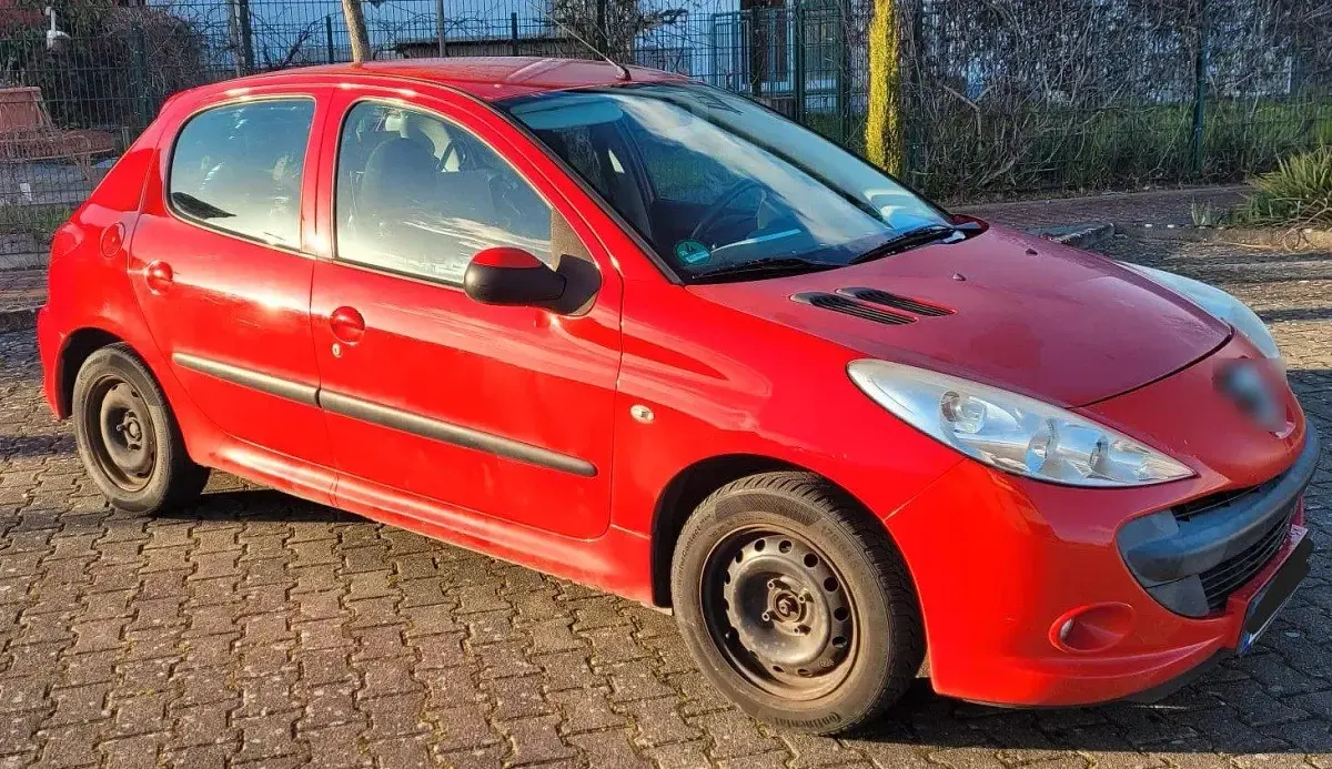 Gebraucht Peugeot 206+ 75 PS (55 kW) 2010 Rot Kleinwagen