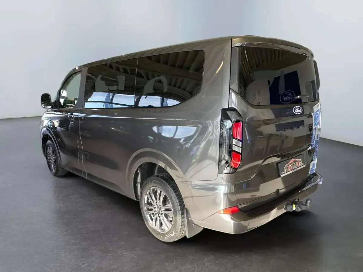 Gebraucht Ford Tourneo Custom Titanium 170 PS (125 kW) 2024 Magneticgrau (metallic) Van