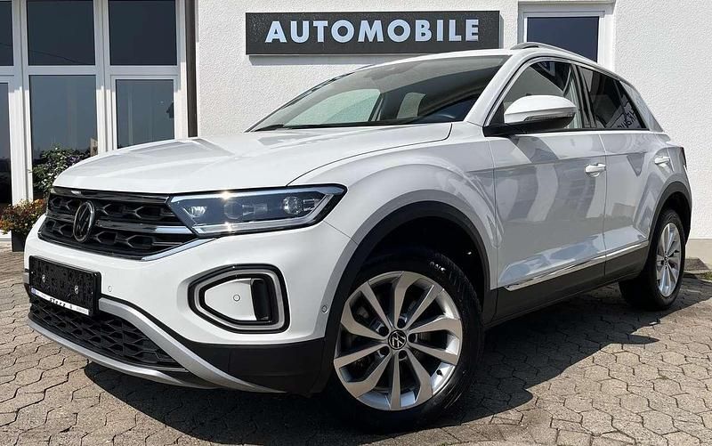 Pure white Gebraucht 2024 VW T-Roc Style SUV | 29.479 € (Fairer Preis) - Bild 1/4