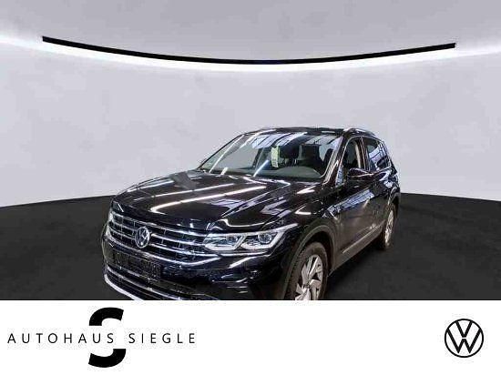 Deep black (metallic) Gebraucht 2021 VW Tiguan Elegance SUV | 28.940 € (Guter Preis) - Bild 1/4