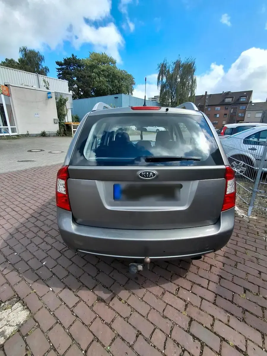 Gebraucht Kia Carens 128 PS (94 kW) 2012 Grau Van / Kleinbus