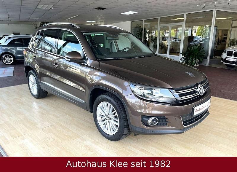 Braun Gebraucht 2014 VW Tiguan Cup SUV | 12.950 € (Fairer Preis) - Bild 1/4