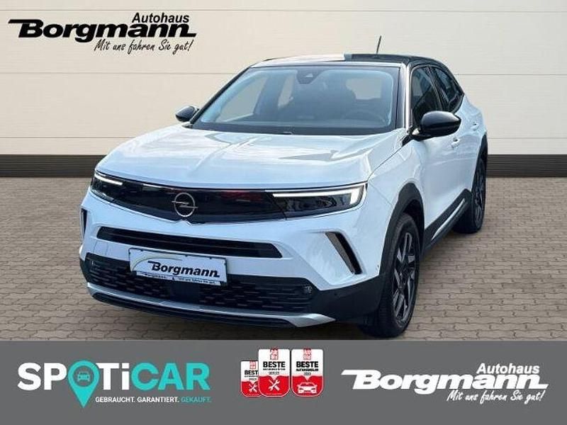 Weiss Gebraucht 2022 Opel Mokka-e Elegance SUV | 20.990 € (Fairer Preis) - Bild 1/4