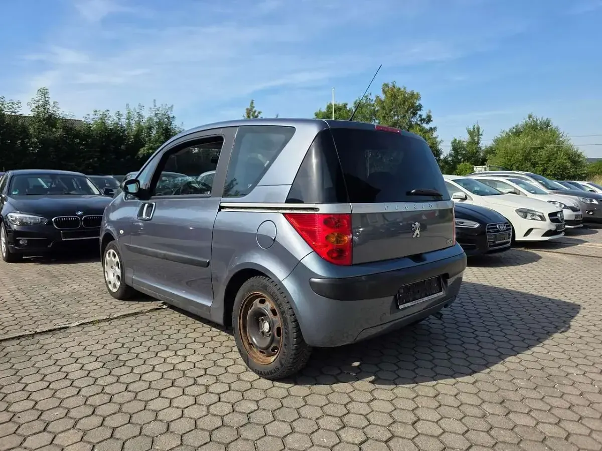 Gebraucht Peugeot 1007 Premium 73 PS (53 kW) 2005 Gris fer Van / Kleinbus