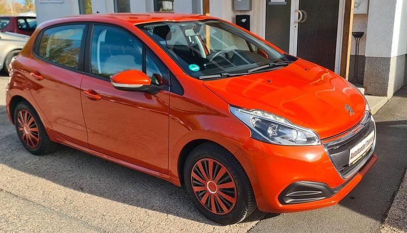 Gebraucht Peugeot 208 Active 82 PS (60 kW) 2017 Orange Kleinwagen