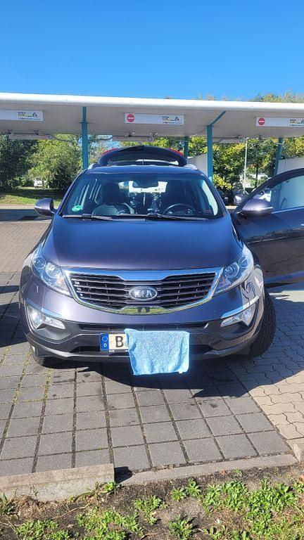 Grau Gebraucht 2013 Kia Sportage Spirit SUV | 10.300 € (Fairer Preis) - Bild 1/4