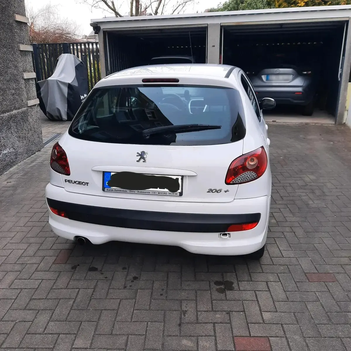 Gebraucht Peugeot 206+ 73 PS (53 kW) 2012 Weiß Kleinwagen