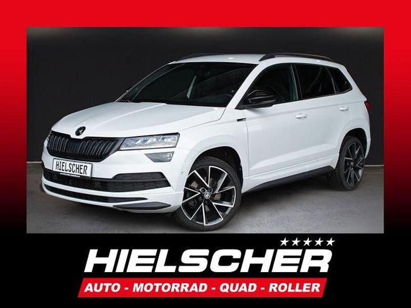 Weiß Gebraucht 2021 Skoda Karoq SportLine SUV | 27.900 € (Teuer) - Bild 1/4