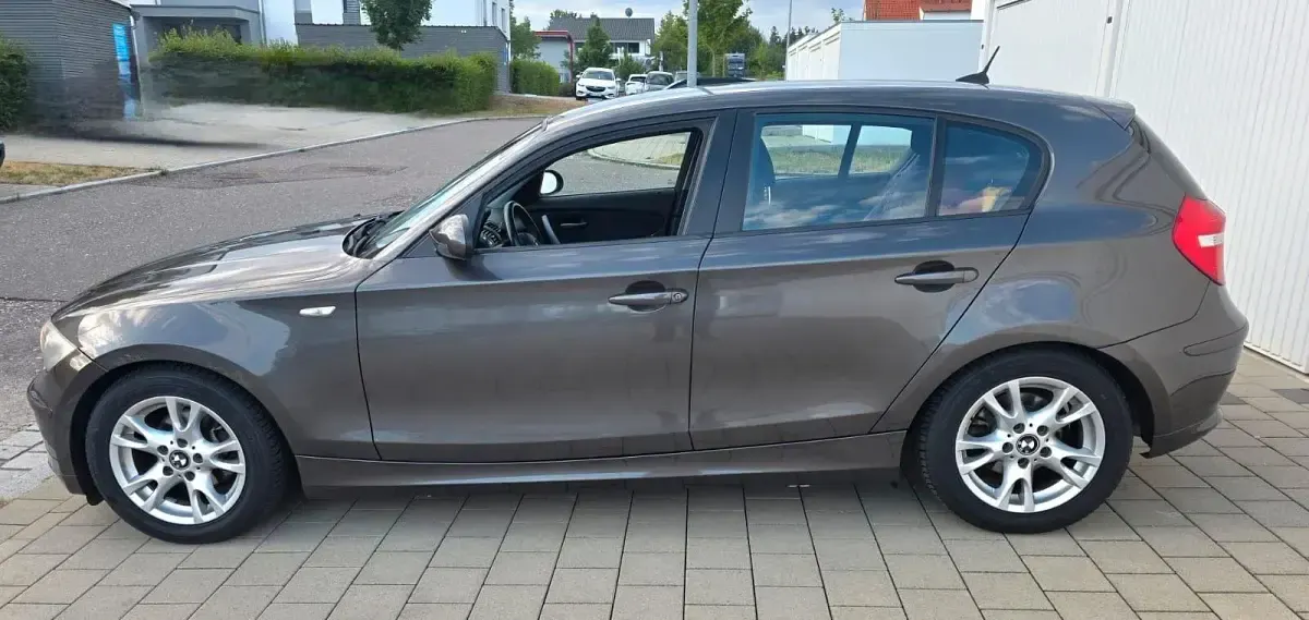 Gebraucht BMW 116 122 PS (89 kW) 2009 Braun Kleinwagen