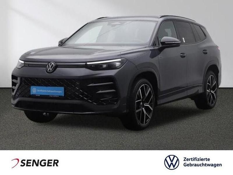 Delfingrau metallic Gebraucht 2025 VW Tayron R-line SUV | 53.880 € (Superpreis) - Bild 1/4