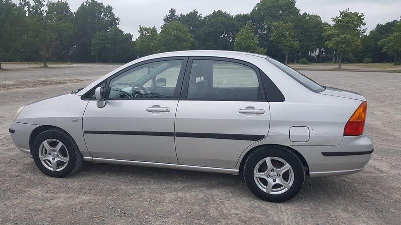 Gebraucht Suzuki Liana 103 PS (75 kW) 2002 Grau Limousine