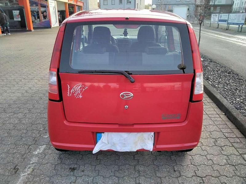 Gebraucht Daihatsu Cuore Plus 58 PS (42 kW) 2006 Rot Kleinwagen