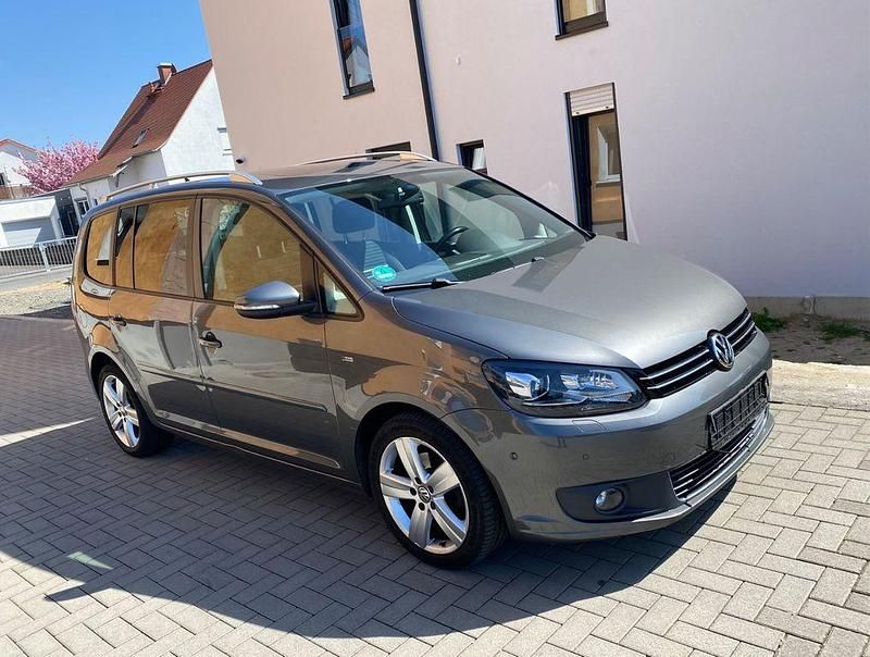 Pepper grey metallic Gebraucht 2014 VW Touran Cup Van / Kleinbus | 8.950 € (Fairer Preis) - Bild 1/4