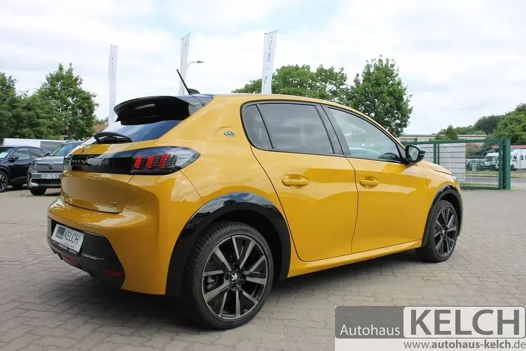Gebraucht Peugeot e-208 GT 100 kW (136 PS) 2023 Faro gelb (metallic) Kleinwagen