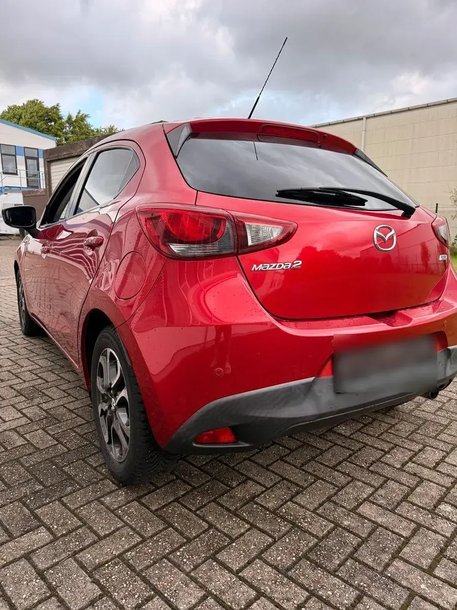 Gebraucht Mazda 2 Exclusive-Line 90 PS (66 kW) 2015 Rot Kleinwagen