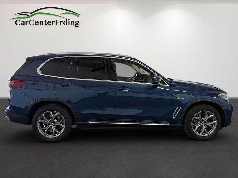 Gebraucht BMW X5 398 PS (292 kW) 2021 Phytonicblau metallic SUV