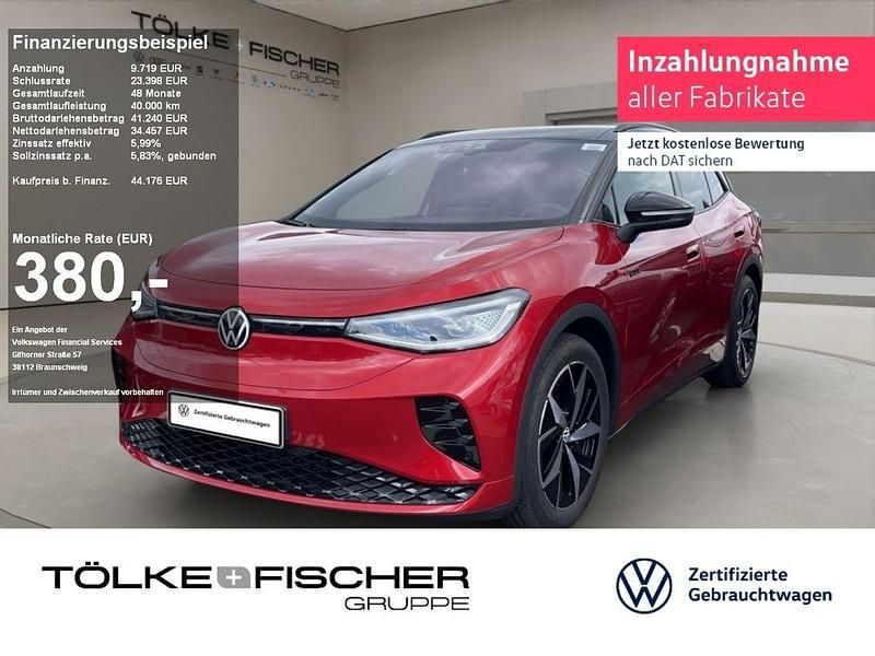 Kings red (metallic) Gebraucht 2023 VW ID.4 GTX SUV | 44.176 € (Fairer Preis) - Bild 1/4