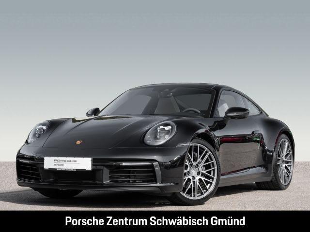 Tiefschwarzmetallic Gebraucht 2024 Porsche 911 Carrera Coupé | 131.880 € (Teuer) - Bild 1/4