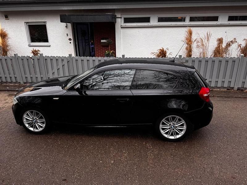 Używany BMW 118 Performance 143 KM (105 kW) 2011 Czarny Hatchback