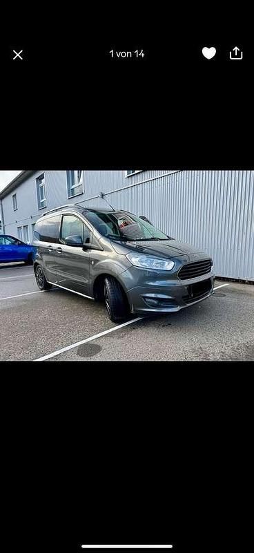 Grau Gebraucht 2015 Ford Tourneo Courier Titanium Van / Kleinbus | 9.500 € (Teuer) - Bild 1/4