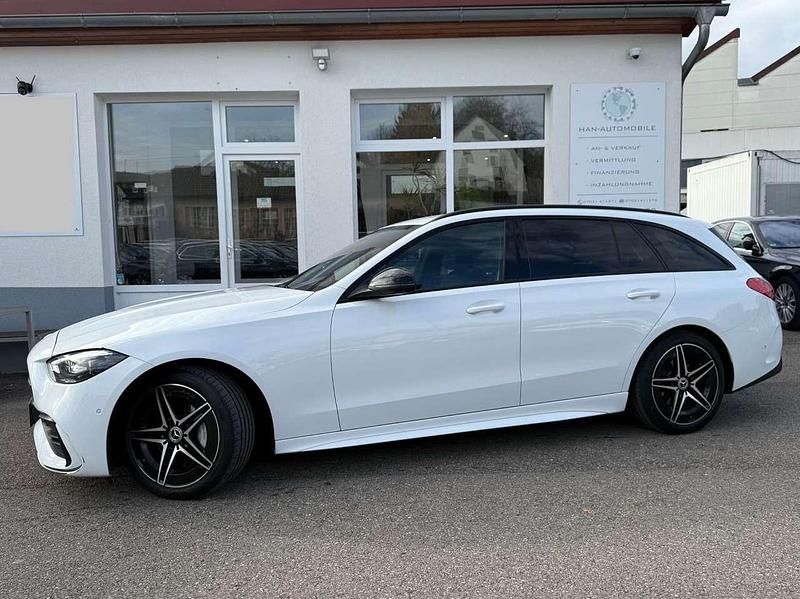 Opalithweiss Gebraucht 2022 Mercedes C220 AMG line Kombi | 29.850 € (Fairer Preis) - Bild 1/4