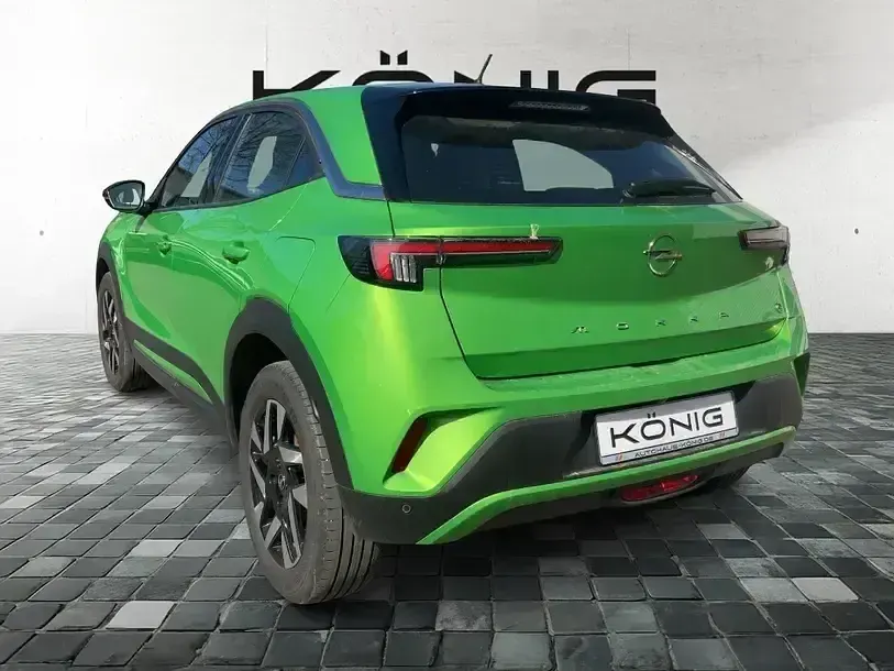 Gebraucht Opel Mokka Elegance 100 kW (136 PS) 2023 Ikone grün (metallic) SUV