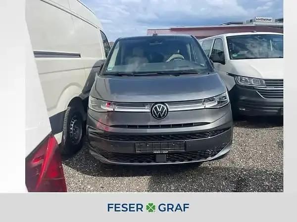 Idiumgrau Gebraucht 2024 VW Multivan Van | 56.480 € (Teuer) - Bild 1/4