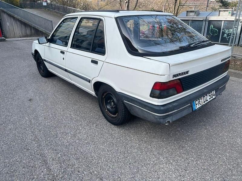 Gebraucht Peugeot 309 75 PS (55 kW) 1990 Weiß Kleinwagen